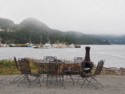 Table and chairs with view of the boat harbor